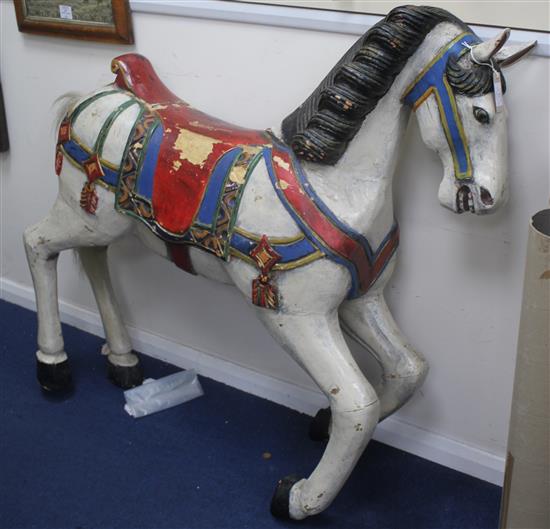 A carved and painted carousel horse, attributed to the Philadelphia Toboggan Company, 3ft 8in.